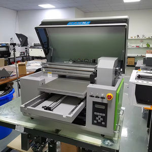 A3 3360 4060 impresora UV 3 en 1 cilindro plano multifunción UV DTF película pegatina opening XP600 I1600 i3200 cabezal de impresión - Product Image 1