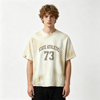 T-shirt sportif vintage délavé effet soleil pour homme, en coton épais et vieilli, coupe oversize, avec motif graphique, vente en gros