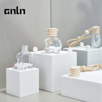 Vente en gros de flacons de parfum pour voiture de 8 ml, vides, à suspendre sur la grille d'aération, avec bouchon à vis en bois, finition mate, avec logo personnalisé, MOQ 100 pièces