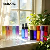 Flacon en verre élégant noir et or à bouton-poussoir, à paroi épaisse, vide, pour sérum, parfum, emballage cosmétique de luxe pour huiles essentielles