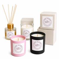 Collection de bougies parfumées au soja en verre givré mat, quatre teintes : rose blush, noir brillant, blanc laiteux, vert menthe pâle