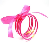 Bracelets en silicone souple scintillants avec nœud doré pour femme, bijoux empilables tendance, cadeau de fête, marque privée sous licence