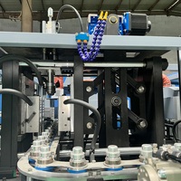 Machine de fabrication de bouteilles PET 2L automatique 2 cavités 2800 BPH TURBO2 Servo Ligne complète de mise en bouteille d'eau, de jus et de boissons avec moule