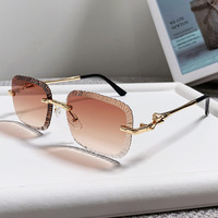 Lunettes de soleil sans monture, monture dorée à coupe diamant, UV400, lunettes de créateur tendance pour hommes et femmes élégants