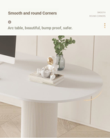 Ensemble bureau et chaise compact de style français moderne pour petites maisons : bureau îlot en dalle de pierre, ton crème, luxe léger