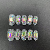 Las uñas cortas prensadas a mano puras con un gran diamante brillante de alta calidad se pueden reutilizar al por mayor de fábrica