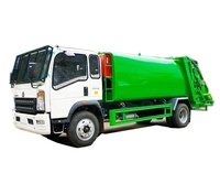 Vente Chaude Direct Usine Afrique Amérique Latine Sinotruk HOWO 4x2 5-10m³ Camion Compacteur de Déchets à Chargement Arrière Hydraulique