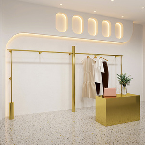Giá đỡ trưng bày quần áo bằng kim loại cho cửa hàng bán lẻ, giá treo váy cưới, thiết kế tùy chỉnh, giá treo quần áo cao cấp gắn tường màu vàng dành cho cửa hàng thời trang - Product Image 1