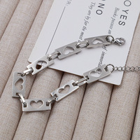 Prix de gros Bracelet chaîne cœur en plaqué or 18 carats de haute qualité Bracelet chaîne cœur creux en acier inoxydable pour femmes