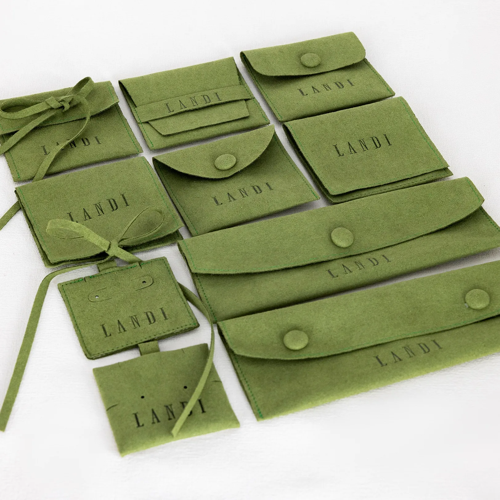 Pabrik langsung Suede serat mikro hijau kantong perhiasan kustom kemasan perhiasan tampilan Faux Suede kantong amplop
