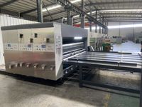 Máquina de Fabricación de Cartón Corrugado con Alimentador de Cadena, Impresión Flexográfica, Ranurado y Troquelado Rotatorio RS4 Slotter