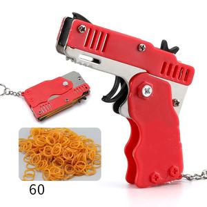 Mainan Promosi LOGO Kustom Mini Pistol Karet Gelang Plastik Pistol Gantungan Kunci Plastik Pistol Lipat Mainan Pistol Lucu untuk Anak - Product Image 1