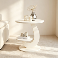Table basse ronde à deux niveaux avec étagères de rangement ; table d'appoint en métal avec cadre incurvé ; idéale pour les petits salons et chambres à coucher