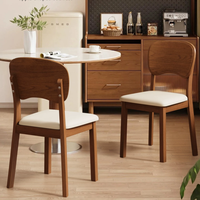 Chaise de salle à manger en bois massif de style mid-century avec assise rembourrée en cuir PU et design antique, mobilier de maison, nouveau modèle 2025