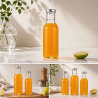 Chine Fabrication OEM Logo 250ml 350ml 500ml Boissons Jus Bouteilles en verre pour jus en vrac avec couvercles