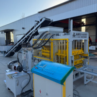 Machine à blocs hydraulique QT4-15 qui fabrique 5 types de blocs, pavés et briques avec système de contrôle automatique