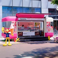 Chariot de restauration rapide polyvalent conçu avec une forme de capsule moderne, chariot de nourriture mobile efficace pour les hot-dogs et les hamburgers