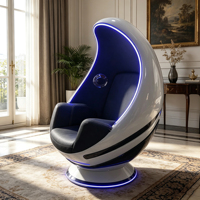 Fauteuil lounge individuel en fibre de verre en forme de vaisseau spatial incurvé avec bande lumineuse LED bleue et coussin en cuir noir pour coin détente à domicile