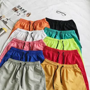 OEM Customized Logo 18 Colors Solid Plain Men Swim Trunks Quick Dry Outdoor Beach Shorts Board Shorts Swimwear For Men