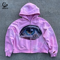 Sweat à capuche rose en polaire surdimensionné avec impression graphique œil aérographe personnalisée, style vintage délavé, streetwear automne, coupe raglan usée