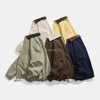 Veste de course en toile pour homme, fine, résistante à l'eau, respirante, sans col, boutonnée sur le devant, coupe ample, style décontracté