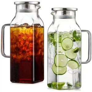 Grande carafe en verre résistant à <span class=keywords><strong>la</strong></span> chaleur avec poignée et couvercle, idéale pour le thé glacé, le café et les boissons froides ou chaudes, à conserver dans le réfrigérateur. - Product Image 1
