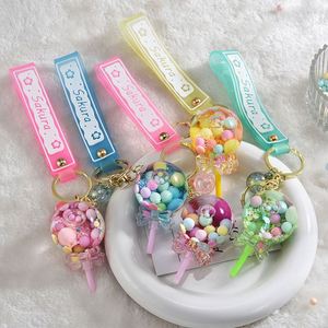 Hot Selling Quicksand Bottle Acrylic Oil Filled Lollipop <b>Key</b> <b>Chain</b> Cute Bag Pendant Car <b>Key</b> Ring Small Gift - Product Image 1