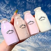 Jouet Squishy en forme de bouteille de lait, 4 couleurs, Macarons Kawaii, jouet à presser en forme de bouteille de thé au lait, cadeau pour fille avec perles