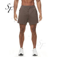Shorts de jogging décontractés en coton molletonné écologique pour hommes avec logo personnalisé, idéaux pour la gym, l'entraînement et la course, avec poches, style boardshorts