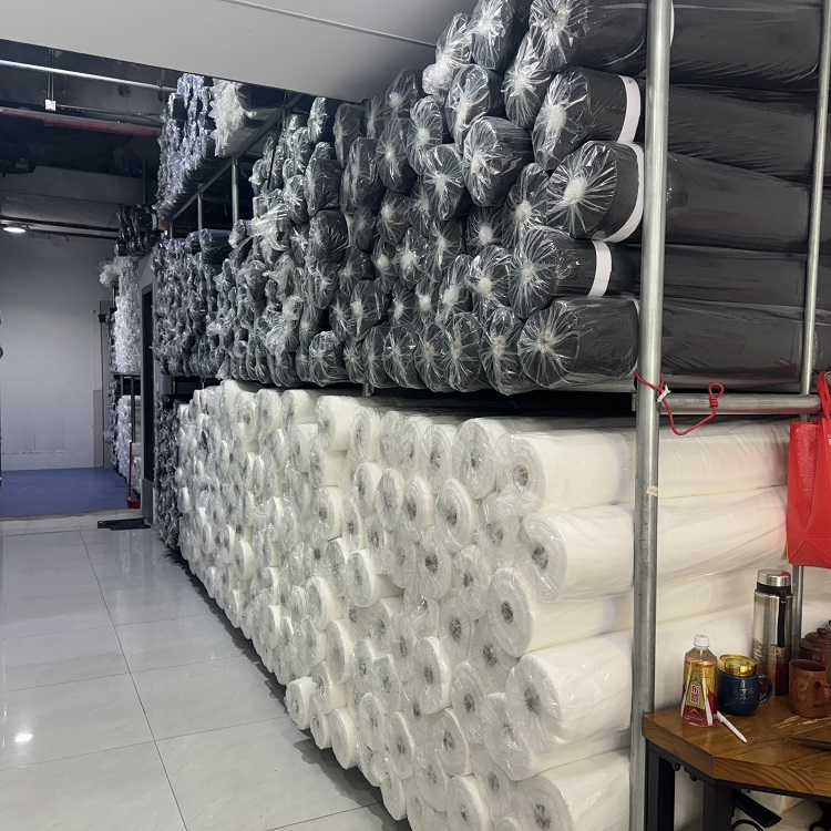 Xiangxing 100% полиэстеровое двойное точечное покрытие плавкое соединяющее нетканое полотно для плавкой одежды