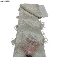 Tissu de dentelle de luxe perlé à franges et sequins pour robes de soirée