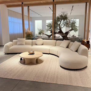 Tối giản nhung đa chỗ ngồi hình chữ <span class=keywords><strong>S</strong></span> bất thường gian hàng màu be vải cong <span class=keywords><strong>sofa</strong></span> đặt cho phòng khách hoặc phòng triển lãm - Product Image 1