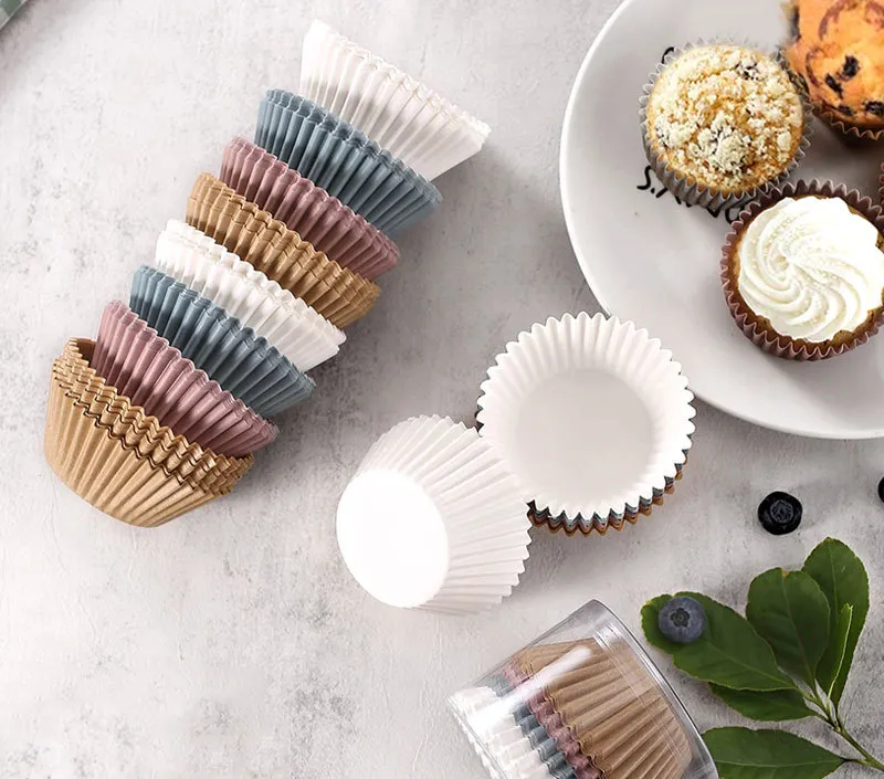 Confezione da 50 fodere per Cupcake in carta pergamena oleata a colori assortiti per la cottura di Muffin