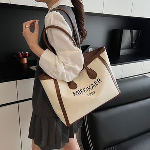 กระเป๋าโท้ทสำหรับเดินทาง ช้อปปิ้ง ทำธุรกิจ  ขนาดใหญ่ ใส่ของได้เยอะ  พร้อมโลโก้สั่งทำพิเศษ สำหรับผู้หญิง - Product Image 4