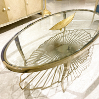 Table basse ovale en acier inoxydable doré pour salon, table d'appoint contemporaine de luxe en une seule pièce