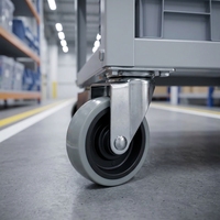 Roue pivotante en PVC grise à fixation par plaque avec frein latéral pour chariot et mobilier
