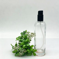 Vente en gros d'usine, flacon en verre transparent rond vide de 170 ml avec pompe à lotion en plastique noir pour sérum, tonique, lotion corporelle