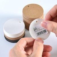 En stock : Étiquettes rondes en carton blanc et noir ; Étiquettes vierges pour magasins de vêtements ; Cartes de certification personnalisées