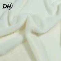 Großhandel Maßgefertigter 100% Polyester Einfarbiger Kurzplüsch Gestrickter Stoff Kunstnerzfell für Bekleidung Heimtextilien Spielzeug