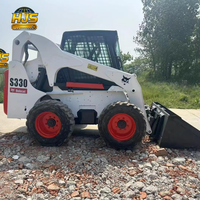 Chargeuse compacte d'occasion S330 avec moteur Kubota, boîte de vitesses et pompe robustes, grande capacité de 1500 kg, pour engins de construction