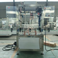 Machine de remplissage linéaire entièrement automatique à 2 têtes, à alimentation par gravité, avec contrôle PLC et écran tactile