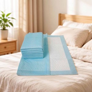 แผ่นรองซับฉี่แบบใช้แล้วทิ้งสำหรับผู้ใหญ่ ขนาด 60*90 ซม. ผลิตจากเยื่อฟลัฟฟ์ย่อยสลายได้ทางชีวภาพ สำหรับโรงพยาบาลและพยาบาล - Product Image 3