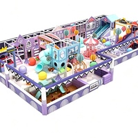 Château gonflable pour enfants de style macaron violet personnalisé avec carrousel et double toboggan