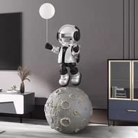 Vente en gros de sculpture de lampe Spaceman pour décor de salon Statue en résine Spaceman Craft Astronaut Smart Voice et Bluetooth Audio