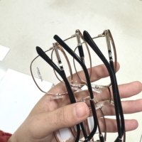 Montures de lunettes en métal légères et tendance de haute qualité en gros, stock de montures optiques en métal unisexe