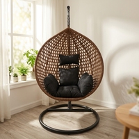Fauteuil suspendu œuf moderne et personnalisé 2026 pour jardin, terrasse, extérieur, en rotin tressé, éco-responsable, durable, avec coussin imperméable