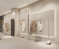 Tienda de ropa moderna Diseño de estante de exhibición interior Exhibición de ropa personalizada Isla Moda Boutique Ideas de decoración