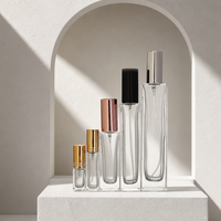 Meilleur prix de gros pour flacon de parfum en verre cylindrique haut avec pompe pulvérisatrice métallique pour les marques de cosmétiques et de soins personnels