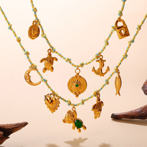 สร้อยคอรูปเปลือกหอยชุบทอง 18K สแตนเลสสตีล พร้อมจี้ปลาดาวเซรามิก ชุดกำไลข้อมือ ของขวัญเครื่องประดับสำหรับทุกเพศ - Product Image 3