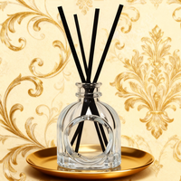Bouteille en verre de diffuseur de parfum à l'huile essentielle transparente personnalisée de 100ml Bouteille de diffuseur de roseaux décorative de luxe unique avec boîte